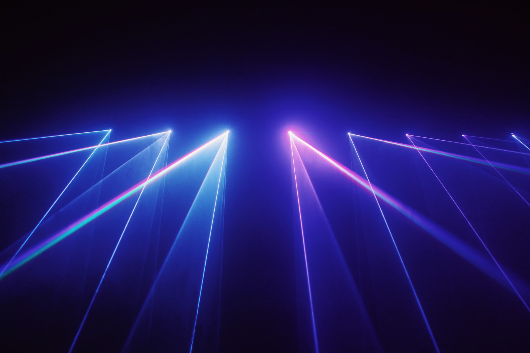 Laser beams cutting through haze
